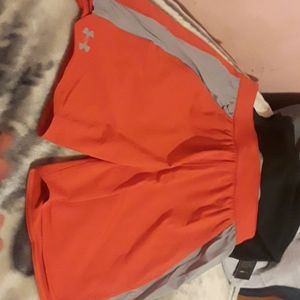Women Under Armour red gray shorts